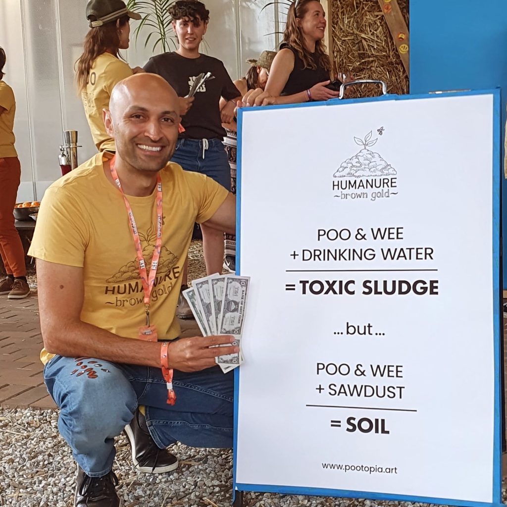 Economist Associate Professor Amir Arjomandi with the VIPoo manifesto at Yours and Owls Festival